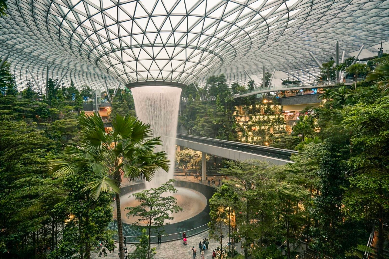 A large-scale biophilic and sustainable art installation featuring ecological themes inside a Singapore shopping mall in 2026.