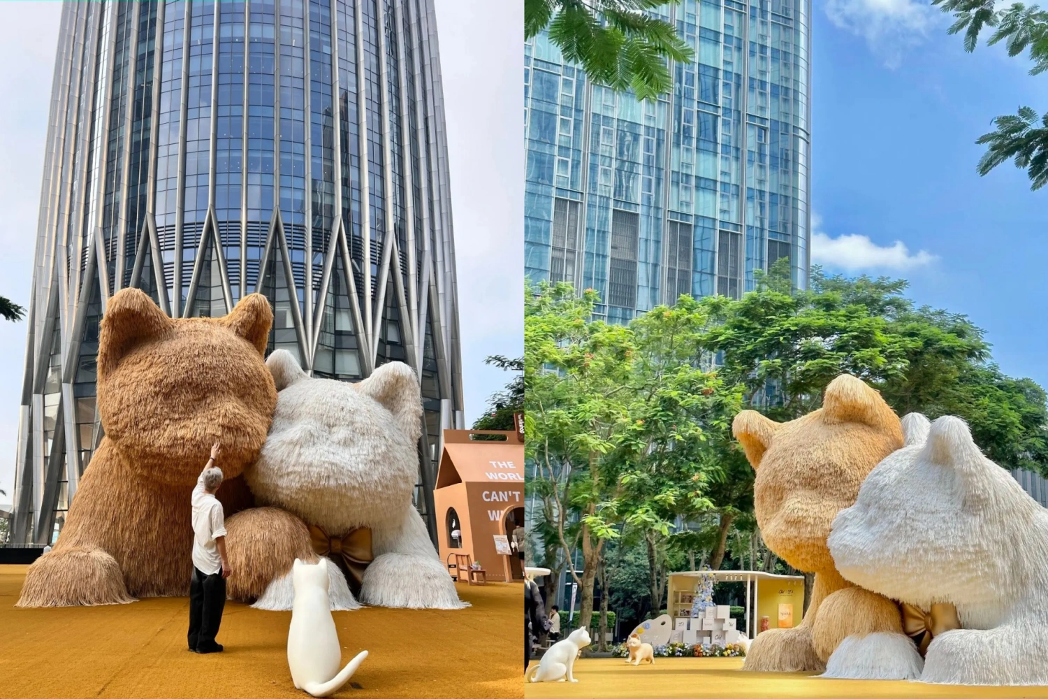 Giant yellow and white cat art installation wearing Christmas red hats, with a staff member interacting to show scale, alongside a small white cat and dog house on the plaza.