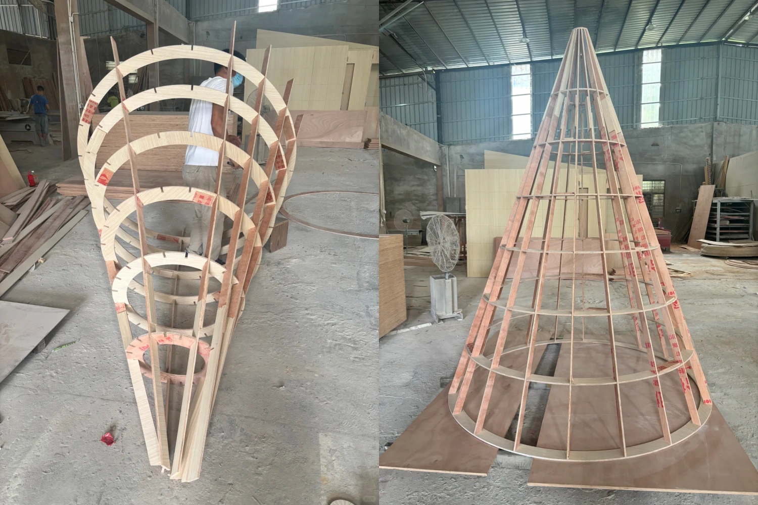 Internal wooden structural framework of a conical tree top for a mall giant tree landscape. Workers reinforcing the side, showcasing the complex and robust support system of large commercial display props.
