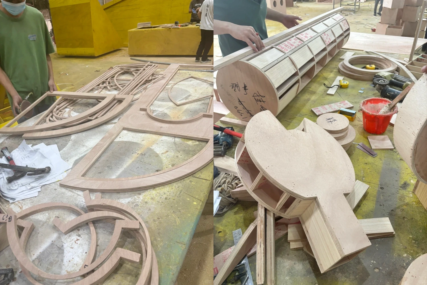 Irregular wooden curved carving pieces and window frames in the prop factory, along with a worker handling details on a large cylindrical structural component.
