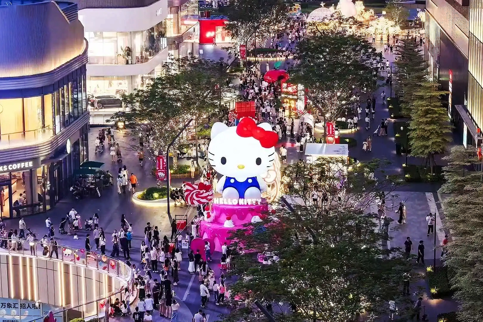 Hello Kitty dream theme exhibition custom installation overview at shopping mall, featuring immersive pink fantasy world with giant character sculptures and interactive displays, custom fabricated by professional art decoration factory-01