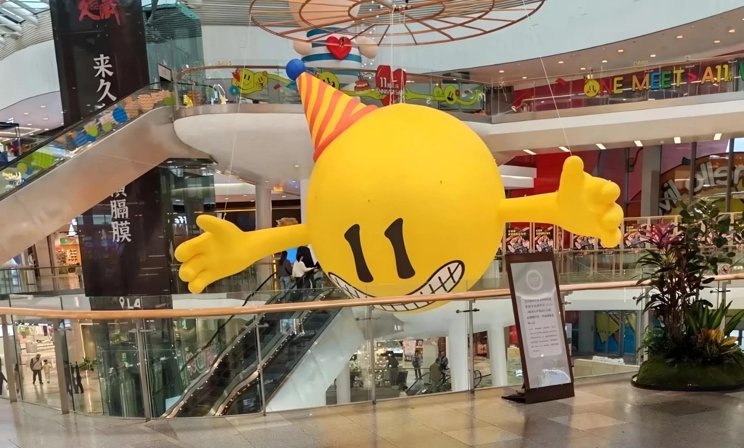 Livat shopping mall custom IP-themed decoration installation overview at atrium, featuring immersive story-driven display with Nordic aesthetics and character art, custom fabricated by professional decoration factory-4