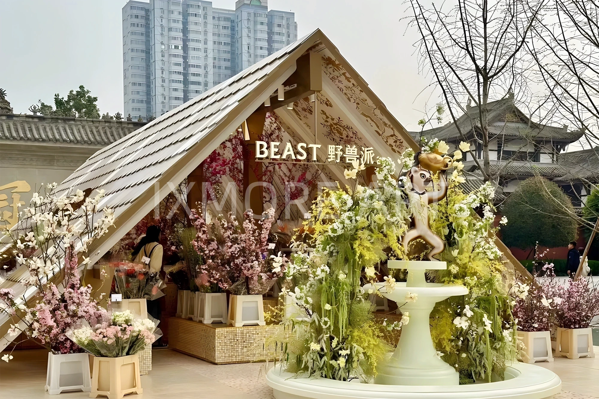 Long shot floral pop-up installation outside mall, event prop fabrication by original art factory, overall finished effect of large custom viral floral pop-up installation(6)