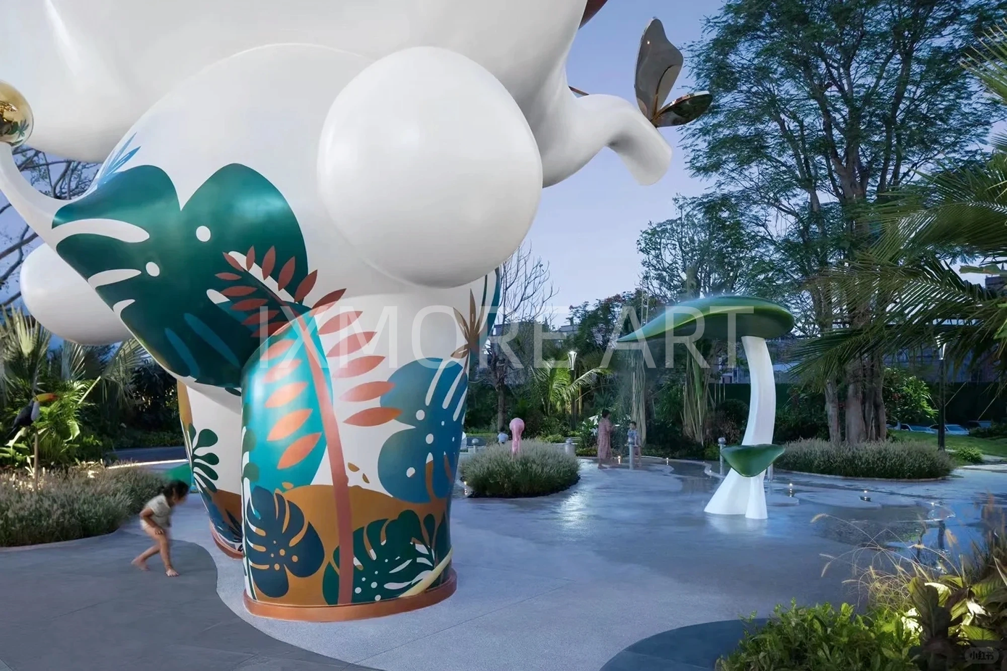 Long shot of Tropical Baby Elephant IP sculpture outside mall, mist spray dynamic device customized by professional art factory, overall finished effect of large outdoor public art installation(8)