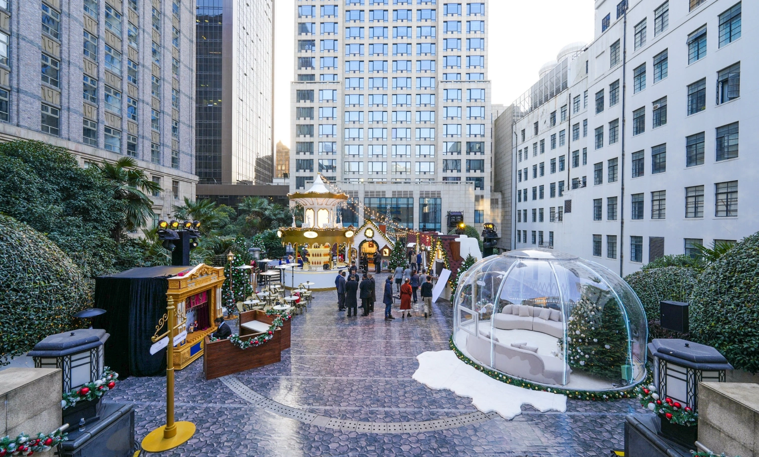 Giant custom Christmas tree centerpiece at Waldorf Astoria hotel plaza, standing [height] meters tall with festive ornaments and sparkling lights, bespoke fabricated by Christmas decoration factory for luxury hotel event-07