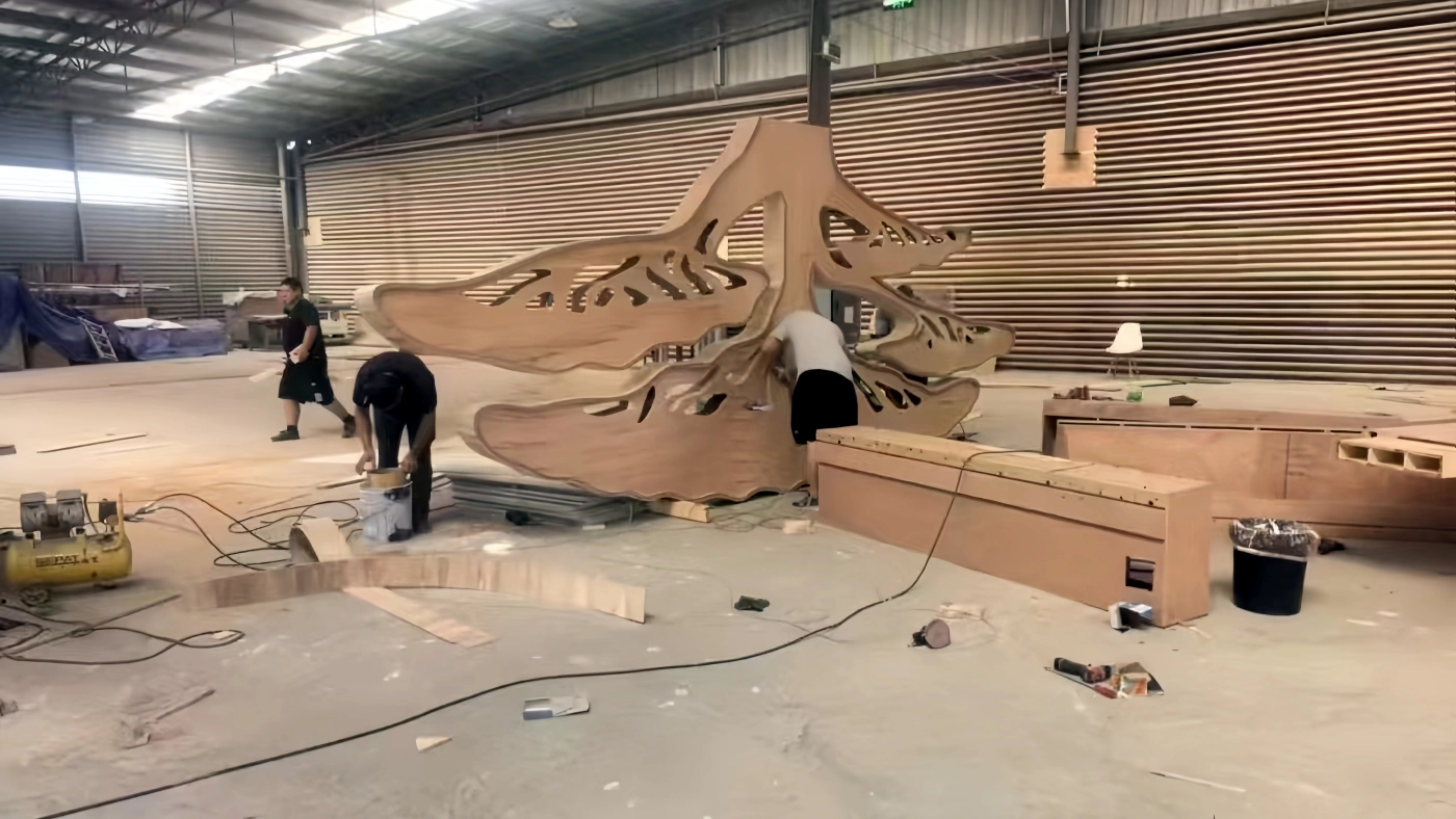 Factory team verifying commercial prop manufacturing capabilities through qualifications and completed project case studies